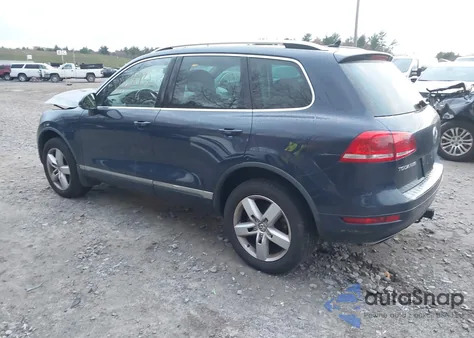2014 Volkswagen Touareg Tdi Lux z USA, uszkodzony, nr VIN WVGEP9BP2ED014591